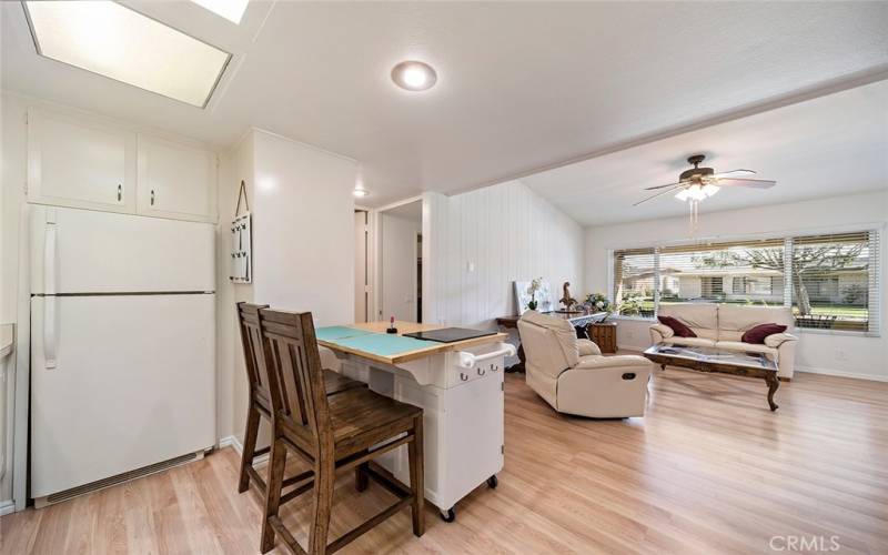 Kitchen looking into living room