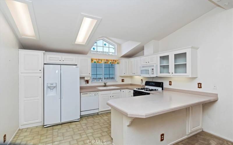 Kitchen with Peninsula open to family room