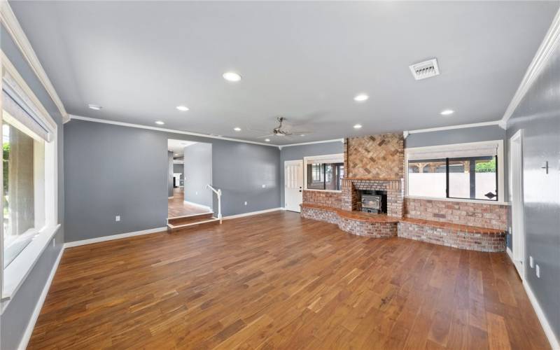 separate sunk in  living room with its own wood burning stove, massive living area