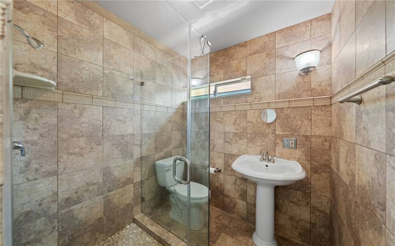 primary bathroom, wiht stand up custom tile shower, new toilet