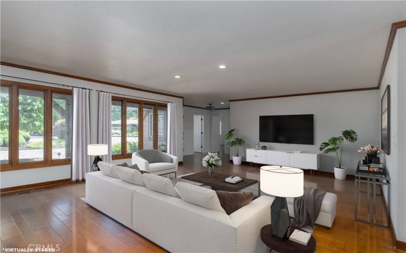 Family room with TV, virtually staged