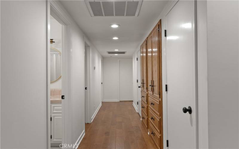 Hallway with custom storage cabinets