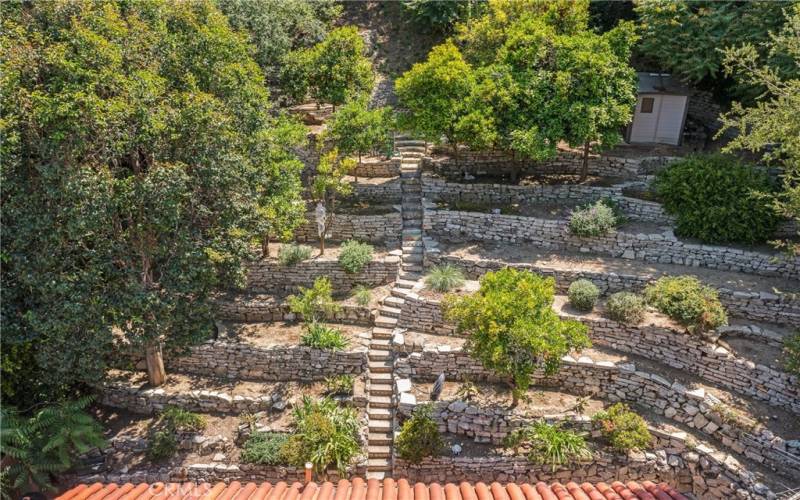 Custom Stone Terraces & Tiled Stairway Leading To Upper Lot