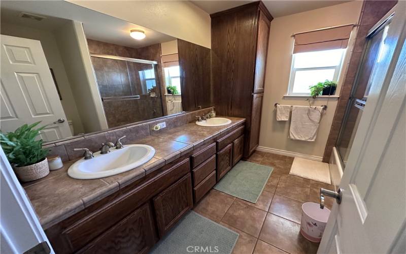 Full bathroom with Jack and Jill sinks.
