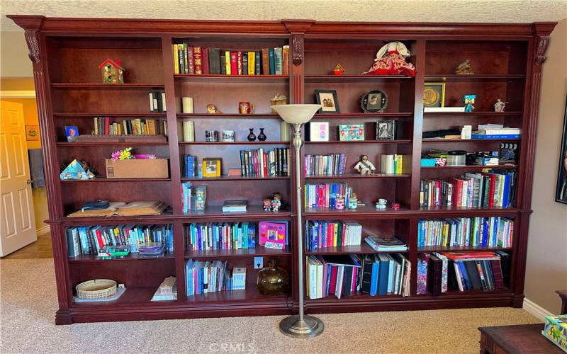 Custom floor to ceiling locally handcrafted bookshelf.
