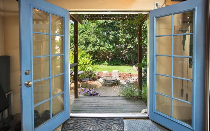 French doors from garage to the backyard.