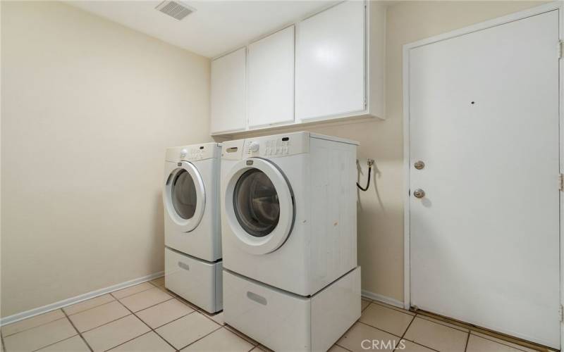 Separate laundry room.