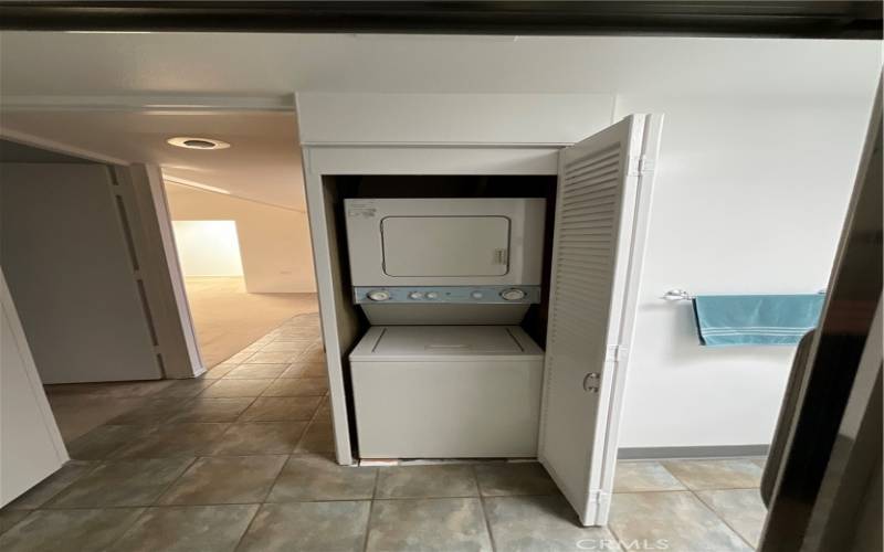 Laundry machines in primary bathroom - included in sale.
