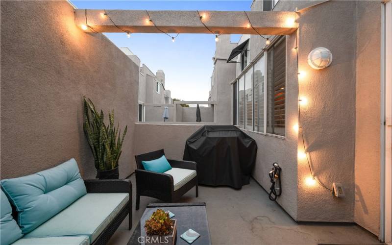 Catch the breeze and enjoy the summer on this beautiful patio