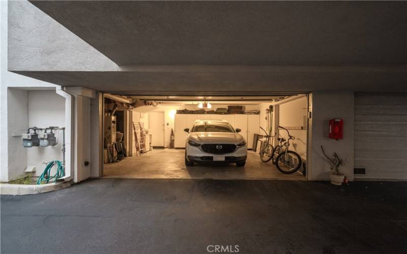 2 car parking garage with built in cabinets