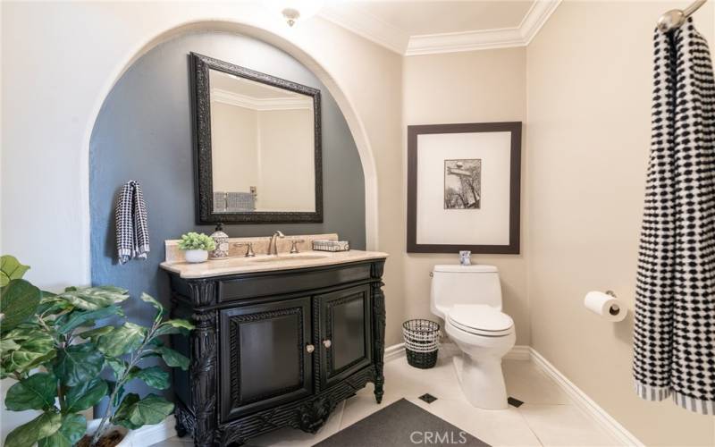 Off the living room is a remodeled guest bathroom.