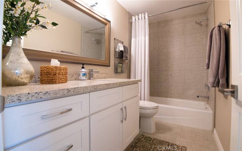 Remodeled guest bathroom located upstairs.