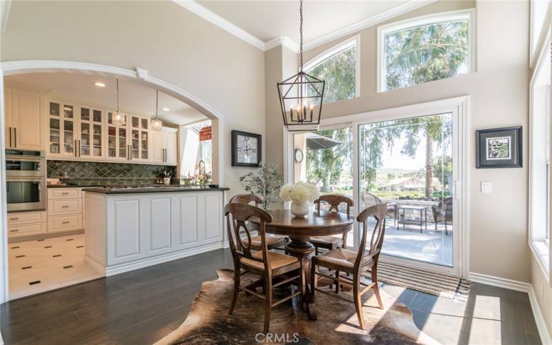 Formal dining room with views of the golf course.