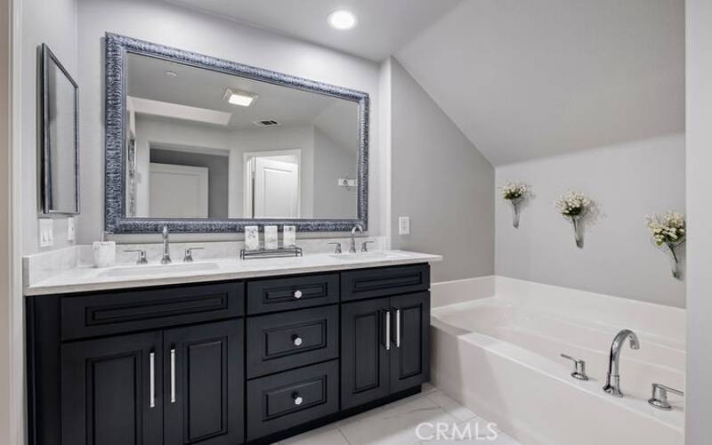 Master bathroom with soaking tub and walk in shower. fully remodeled.