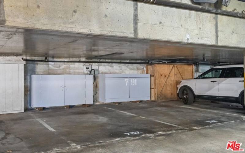 2 parking spaces with storage cabinets