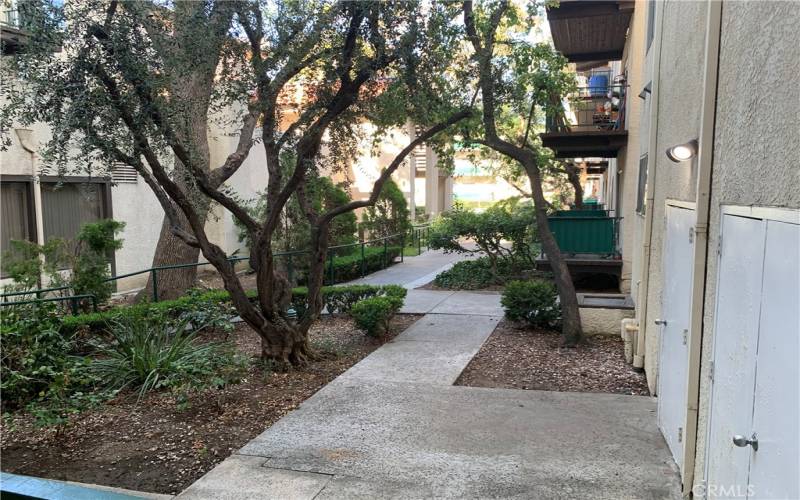 Nice path to pool recreation room gym and tennis courts