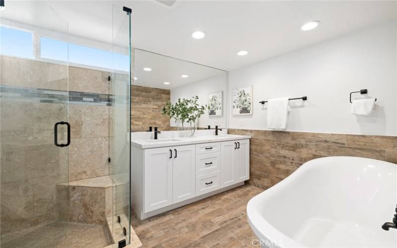 Primary bath w/soaking tub & walk-in shower.