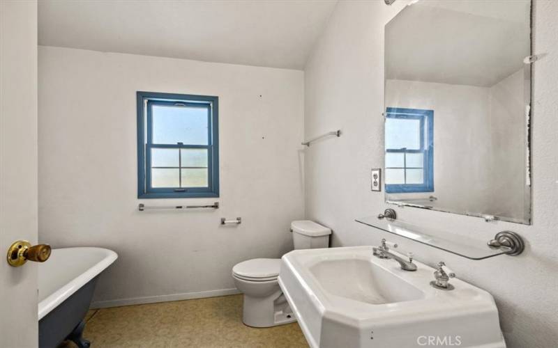 Upstairs bathroom with claw foot tub