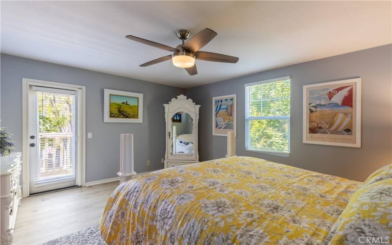 The primary suite in Plan C Surrey Farm homes are spacious and include a private balcony, seating area space, dual closets, and a large spa like en suite with separate shower and soaking tub