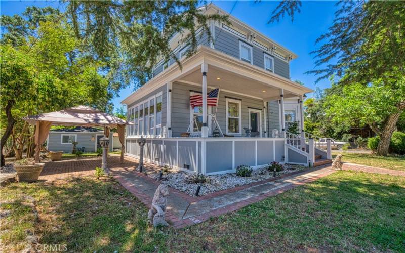 Spacious front porch for afternoon relaxing.