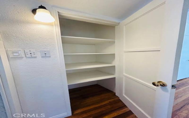 Closet in Hallway offering plenty of space for linings.