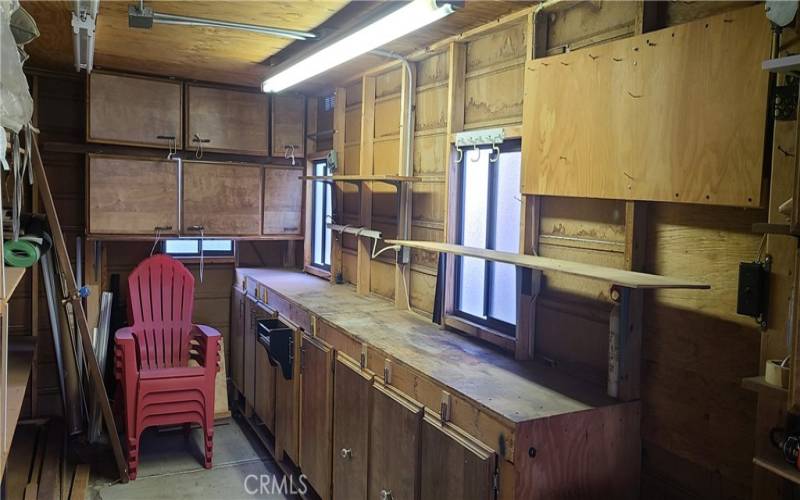 Shed with Built-in Work Benches and Shelving