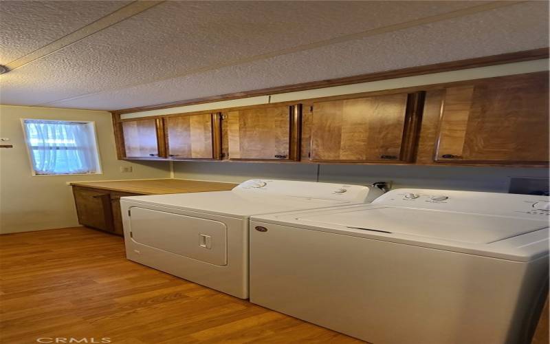 Laundry Room with Access to Carport