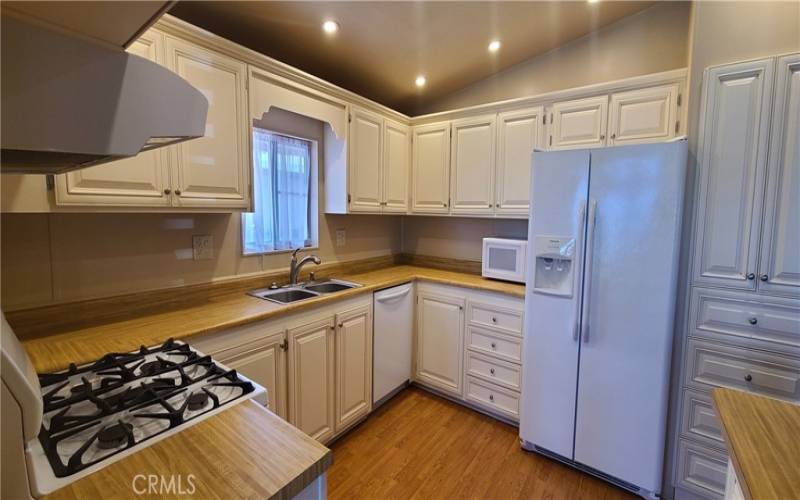 Large Kitchen with Plenty of Antique White, Soft-Closing Cabinetry