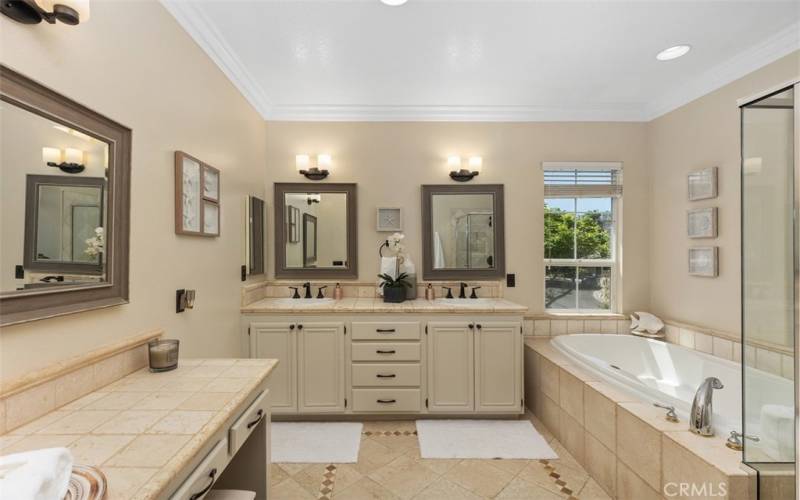 Master bathroom is over sized and has dual vanities and a separate makeup vanity