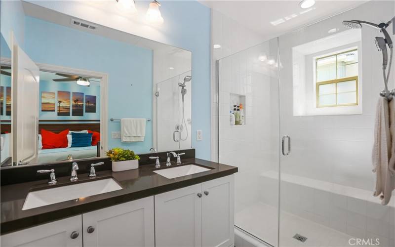 Primary bathroom with double sink vanity.
