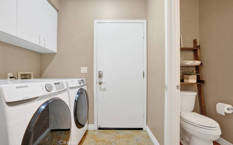 The downstairs laundry area is right off of your garage access.