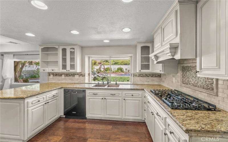 Updated kitchen with granite counters/ 6 burner range top and kitchen aid dishwasher