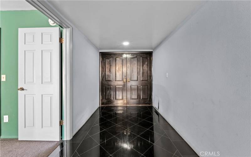 Foyer Leading to a Living and Dining Rooms