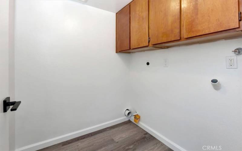Laundry room with gas and Electric hookups for dryer