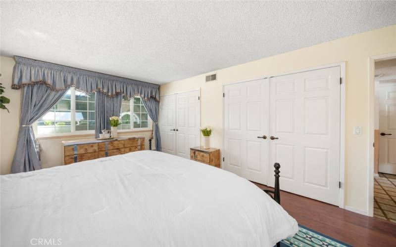 Master Bedroom with his and her closets