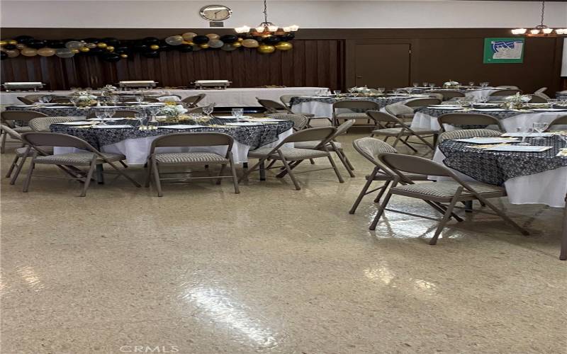 Clubhouse dining room showing set up for an event by the social committee for those who live in Cedarhills estates and the friends or family the invite. Clubhouse can be rented by residents.