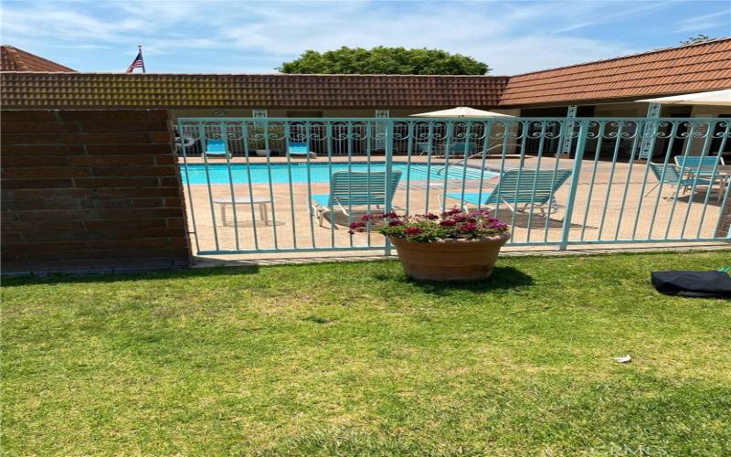 View looking toward the pool patio and pool. Large spa for soaking is in its own room of the pool.