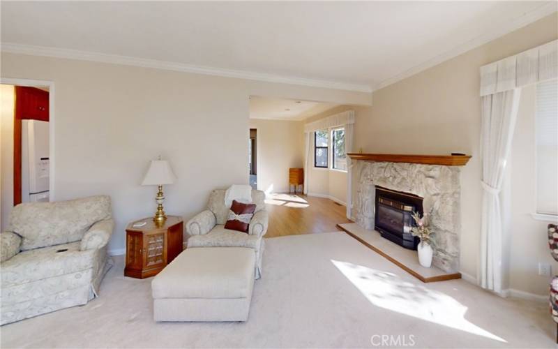 Other side of living room looking into formal dining room