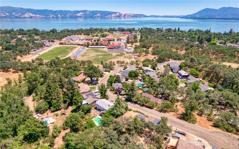 Second house from top left within minutes to school and lake.