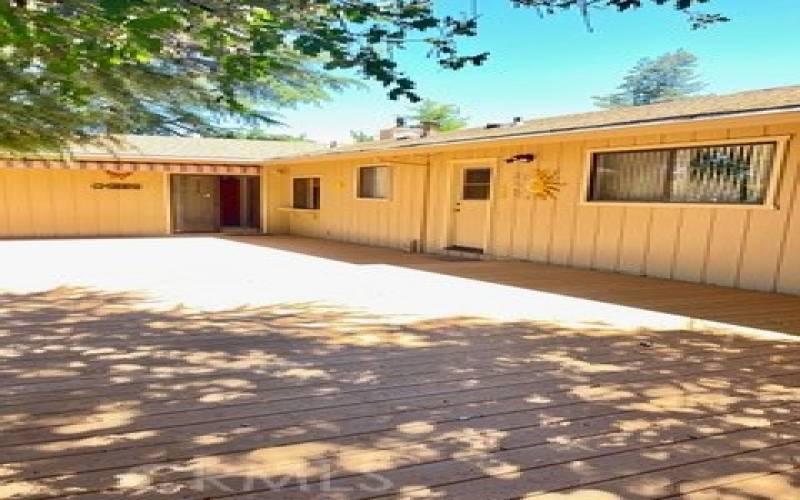 Sliding door off great room and laundry room leads to this large deck