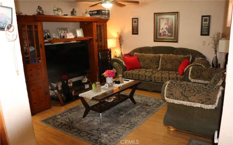 main living room space. wood floors in good condition