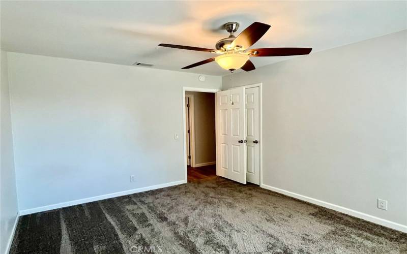 3rd Bedroom on the left. New carpet, closet doors and ceiling fan.