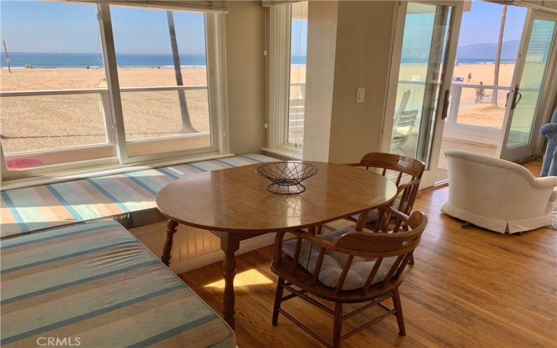 Breakfast Nook leads into Living Room with Spectacular Ocean, Beach, and Mountain Views!