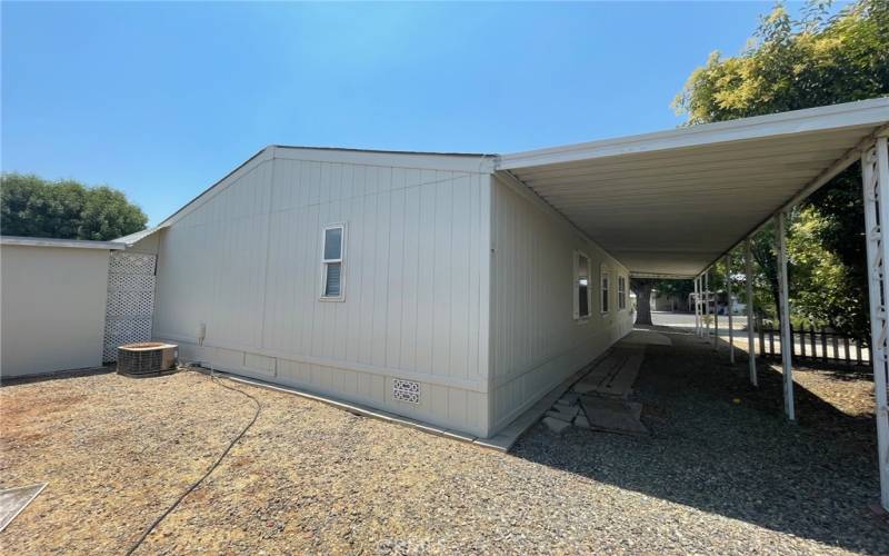 Rear Of House and Shed w Door to Garage Area