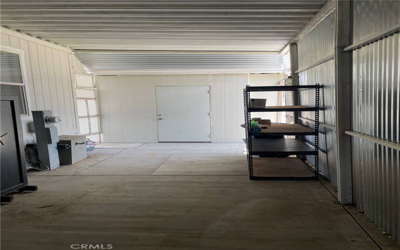 Inside Garage w Private Large Storage Shed