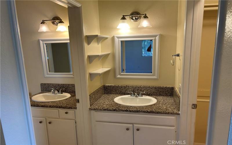 Master sink area with Jack and Jill shared shower.