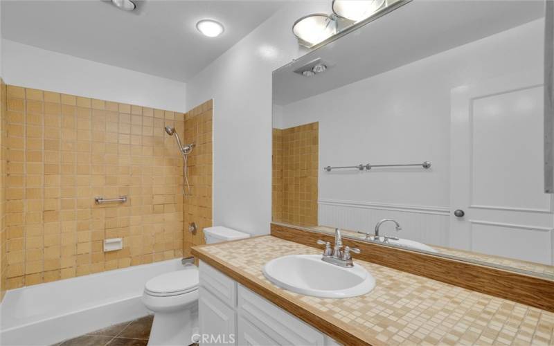 Bathroom includes shower/tub combo.