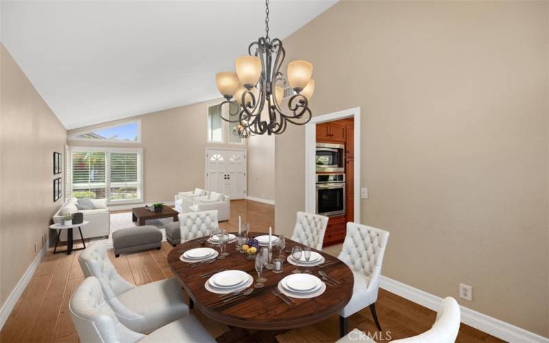 Lovely dining room and open floor plan with the living room.

Note: Photo is virtually staged.