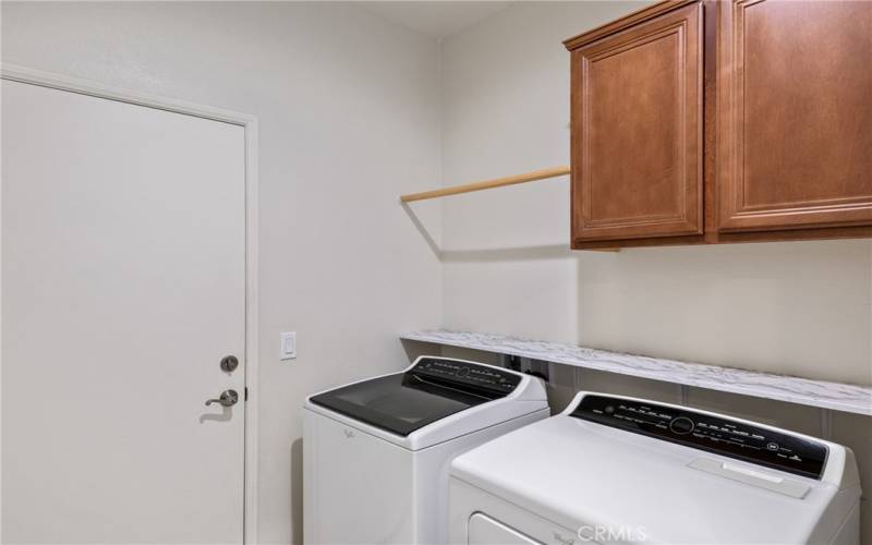 In-door laundry with storage cabinets