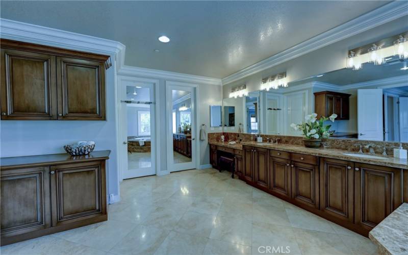 Spacious ensuite bath has 2 separate walk in closets and a linen closet to the left of this photo.